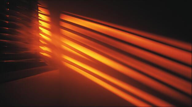 Shadows and light create an orange glow in a room photo