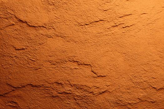 Textured orange wall with earthy tones and patterns photo