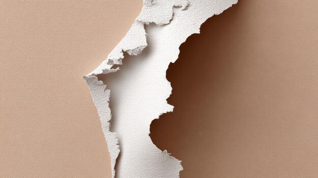 Torn paper revealing a subtle background texture photo