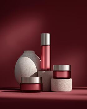 high-end skincare set arranged on a deep amaranth gradient background photo