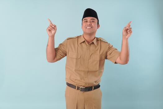 government worker with khaki uniform giving gesturing pointing at the copy space a picture PNS, ASN civil, servant concept photo