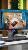 vertikal modern arkitektur arbetsyta terar dubbel monitorer med 3d tolkning programvara och golv planen layouter på skärm. interiör design, utarbetande och teknik fokuserade på kreativitet och innovation. video
