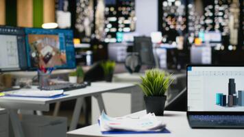 Contemporary office desk with CAD interface displaying digital blueprints and 3D renders of architectural projects. Ideal for architecture and construction professionals engaged in planning. video