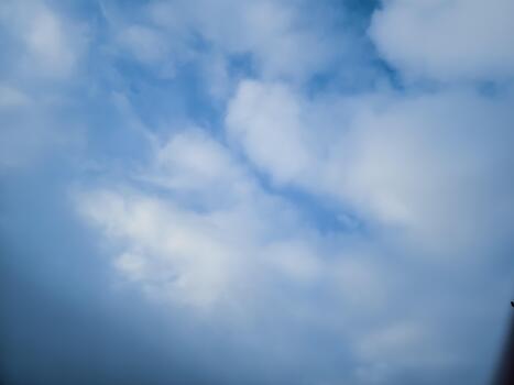 A view of a building with a large clock on it photo