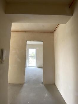 A room with a door and a window in it photo