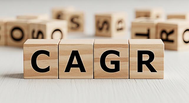 Wooden blocks displaying CAGR on a bright surface representing compound annual growth rate in a financial setting conveying a sense of investment strategy and longterm financial planning photo