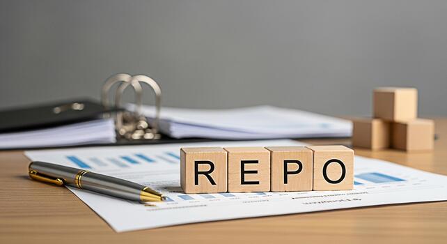 Wooden blocks spelling REPO resting on a financial chart in a bright office symbolizing repurchase agreements and financial transactions with a focus on business and investment strategies photo