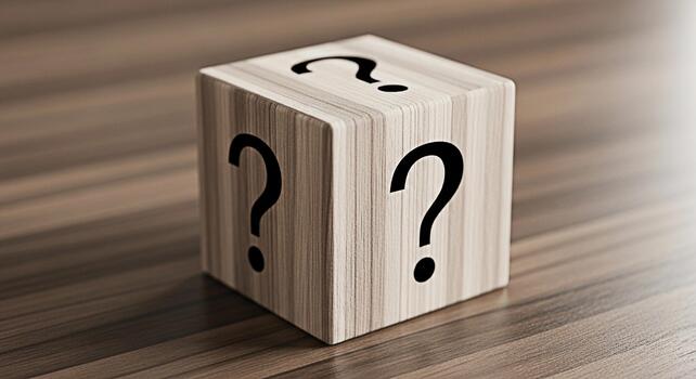 Wooden cube displaying question marks on a wooden surface representing uncertainty and the need for answers in a business or personal context creating a sense of mystery and intrigue photo