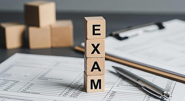 Wooden blocks spelling EXAM stacked on a financial document with a pen symbolizing the pressure and importance of academic assessments in a professional setting creating a mood of seriousness and focu photo