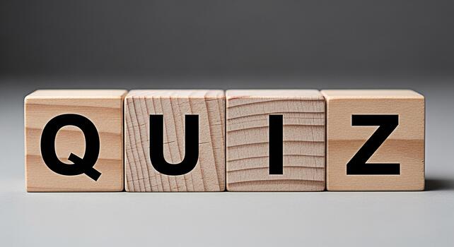 Wooden blocks spelling QUIZ on a neutral surface inviting participation in a fun and engaging knowledge assessment promoting learning and intellectual stimulation in an educational environment photo