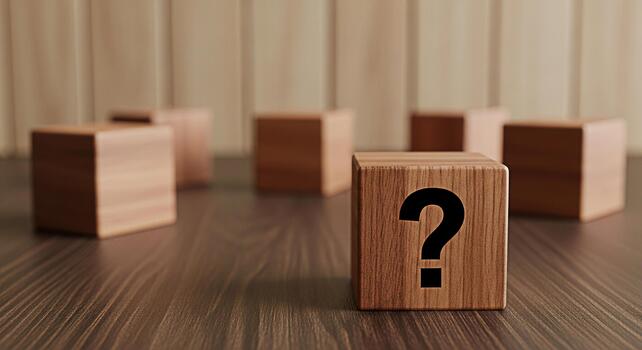 Wooden blocks displaying a question mark on a wooden surface representing uncertainty and the search for answers in a conceptual and minimalist setting evoking curiosity and problemsolving photo