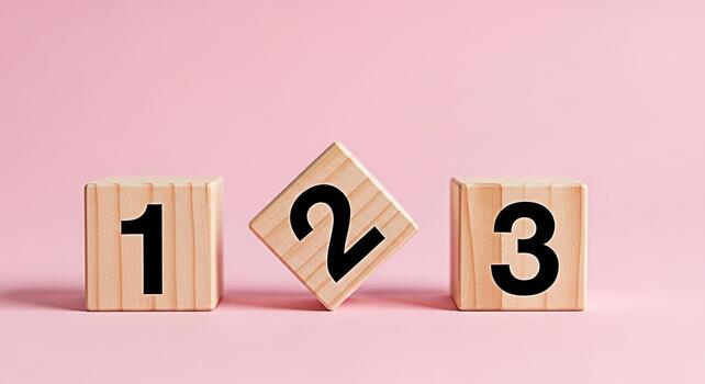 Wooden blocks displaying numbers one two and three on a pink surface promoting learning and early childhood education in a bright and playful environment symbolizing growth and development photo