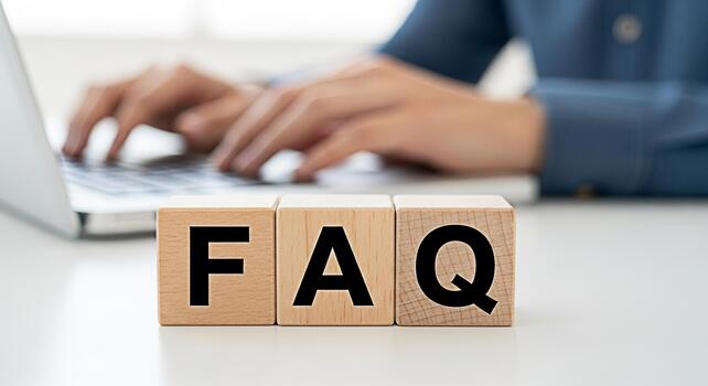 Customer service representative answering questions on a laptop with FAQ blocks on a white desk conveying support and assistance for online help and information creating a helpful and informative atmo photo