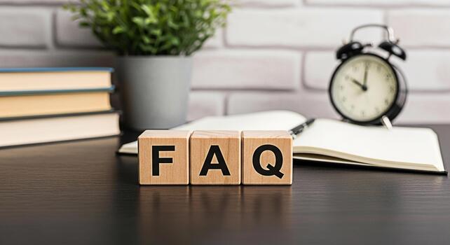 Wooden blocks displaying FAQ on a desk in a bright office setting symbolizing information access and customer support creating a sense of clarity and helpfulness for online resources and problemsolvin photo
