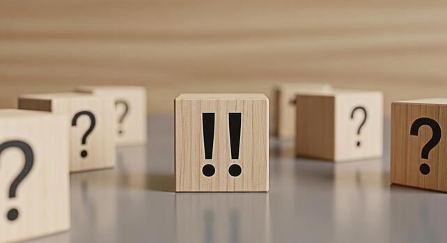Wooden blocks displaying question marks and exclamation points on a reflective surface representing uncertainty and clarity in decisionmaking creating a sense of contrast and thoughtful consideration photo