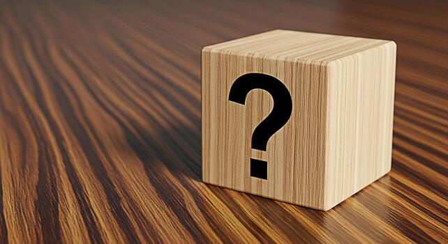 Wooden cube displaying a question mark on a wooden surface representing uncertainty and the need for answers in a business or educational setting creating a sense of curiosity and problemsolving photo