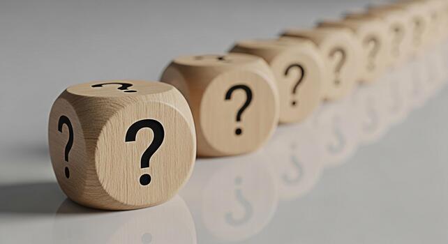 Row of wooden dice displaying question marks on a reflective surface symbolizing uncertainty and the need for answers in a complex and challenging business environment creating a sense of mystery and photo