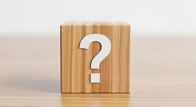 Wooden block displaying a question mark on a wooden surface symbolizing uncertainty and the need for answers evoking curiosity and problemsolving in a minimalist setting photo