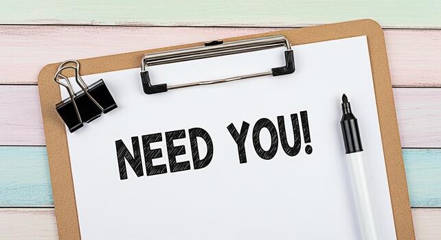 Urgent recruitment message on a clipboard with a marker conveying a sense of immediacy and opportunity in a colorful inviting workspace emphasizing the need for talent and the potential for growth photo