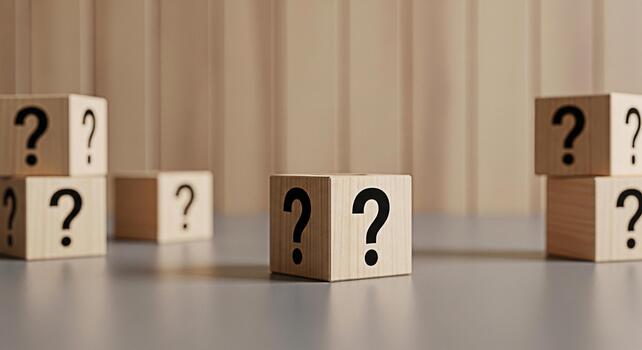 Wooden blocks displaying question marks in a studio setting symbolizing uncertainty and the need for answers fostering a sense of curiosity and problemsolving ideal for educational and business concep photo