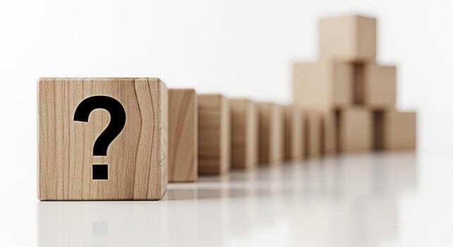 Wooden block displaying a question mark stands out in a row of blocks symbolizing uncertainty and the need for problemsolving in a bright minimalist setting fostering a sense of curiosity and inquiry photo