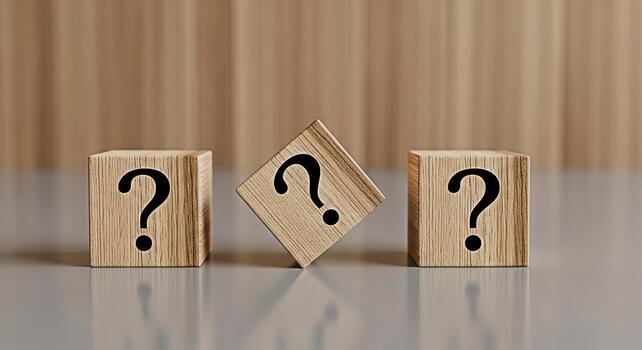 Three wooden blocks displaying question marks on a reflective surface against a wood panel background symbolizing uncertainty problemsolving and the search for answers in a minimalist and conceptual s photo