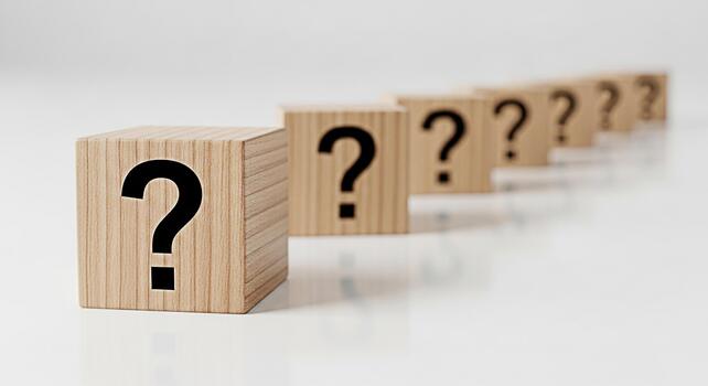 A row of wooden blocks displaying question marks on a white surface representing uncertainty and the need for answers in a clean minimalist setting evoking curiosity and problemsolving photo