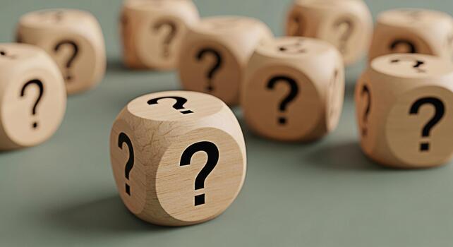 Wooden dice displaying question marks on a neutral background symbolizing uncertainty and the need for answers in business education and personal life creating a sense of curiosity and challenge photo