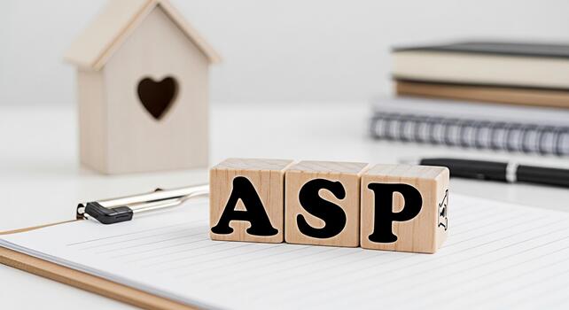 Wooden blocks spelling ASP resting on a clipboard in a bright minimalist office setting symbolizing the importance of planning and organization in achieving success and maintaining a balanced lifestyl photo