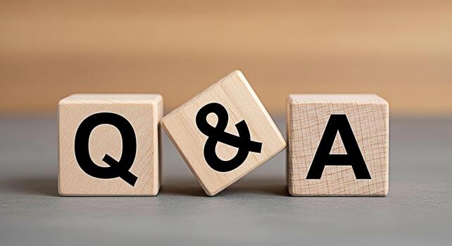 Wooden blocks displaying Q A on a gray surface symbolizing questions and answers representing knowledge learning and information exchange in a simple educational setting fostering curiosity and unders photo