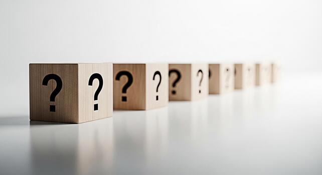 Wooden blocks displaying question marks in a bright studio setting symbolizing uncertainty and the need for solutions inviting exploration and problemsolving with a clean minimalist aesthetic photo