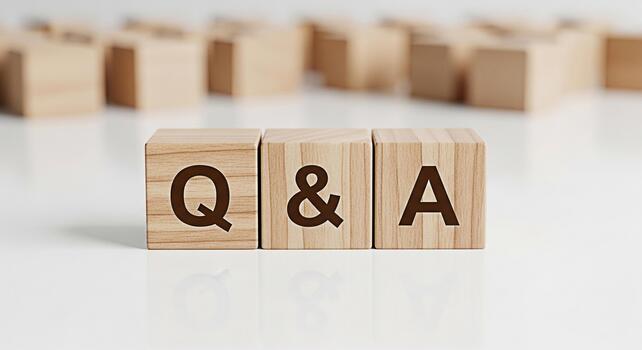 Wooden blocks displaying Q A on a white reflective surface representing questions and answers in a clean and minimalist setting conveying clarity and information for business or educational purposes photo