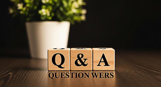 Wooden blocks displaying Q A on a wooden table in a dimly lit room symbolizing knowledge learning and the importance of asking questions for understanding and problemsolving with a decorative plant in photo