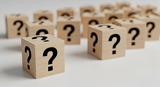 Wooden cubes displaying question marks on a clean white surface symbolizing uncertainty and the search for answers in a minimalist and thoughtprovoking composition ideal for business and educational c photo