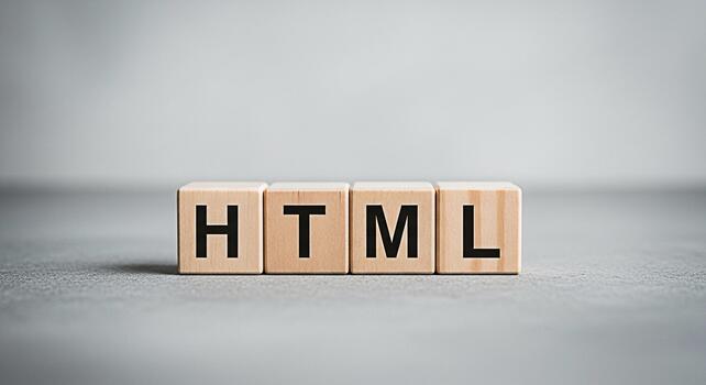 Wooden blocks spelling HTML on a gray surface representing web development and coding concepts in a minimalist and clean studio environment symbolizing technology and digital literacy photo
