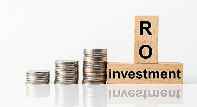 Stacks of coins increasing in value next to wooden blocks spelling out ROI on a reflective white surface symbolizing successful investment and financial growth with a focus on return on investment photo