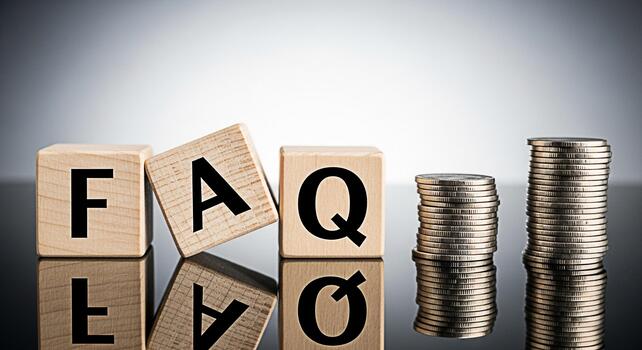 Wooden blocks spelling FAQ with stacked coins on a reflective surface representing financial questions and answers suggesting clarity and informed decisions in a business and investment context photo