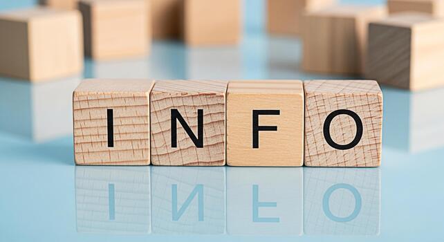 Wooden blocks spelling INFO on a reflective blue surface conveying knowledge and information in a clean minimalist setting ideal for educational materials and business presentations photo