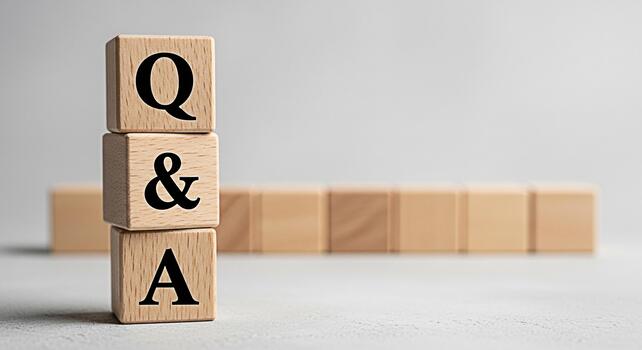 Wooden blocks stacked with QA letters in a bright studio setting representing questions and answers knowledge sharing and problemsolving for business education and customer service concepts photo