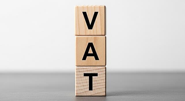 de madera bloques mostrando IVA en un neutral superficie representando valor adicional impuesto y financiero conceptos en un sencillo limpiar estudio ajuste transporte claridad y importancia en negocio y Finanzas foto