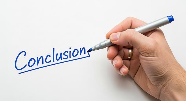 Closeup of a hand underlining the word Conclusion on a white surface with a blue marker symbolizing the end of a process project completion and a sense of finality and achievement photo