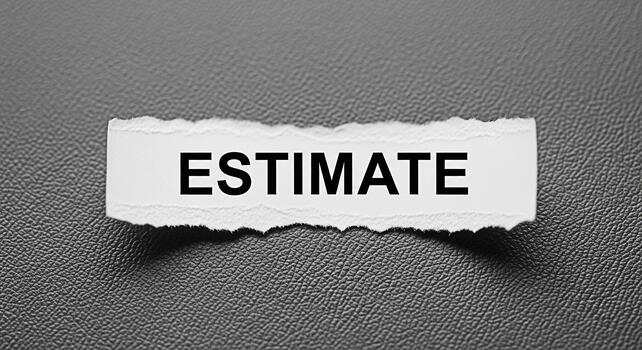 Torn paper scrap displaying the word Estimate on a textured gray surface representing cost analysis and financial planning with a focus on budget and project management photo