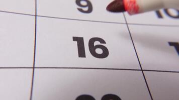 Highlighting date number 16 on a calendar, with a bold red cross mark video