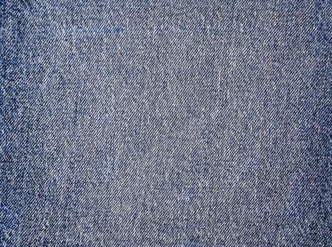 Background in light denim fabric. photo