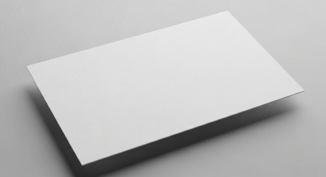 Clean and Minimalist White Paper Mockup on Grey Background photo