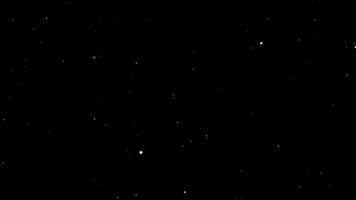 Sanft Weiß Partikel ziehen um sanft im dunkel Raum Erstellen Ruhe schwebend abstrakt Hintergrund video