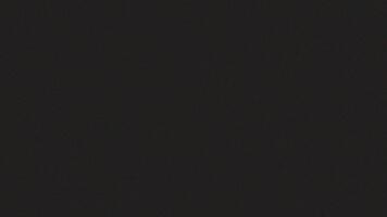 un astratto animazione di televisione statico con leggero riflessi apparendo e scomparsa contro un' buio sfondo. il tremolante illuminazione crea un' cinematico effetto ricorda di un vecchio film. video