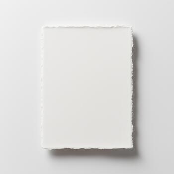 Blank white card with deckle edges on a clean light background photo