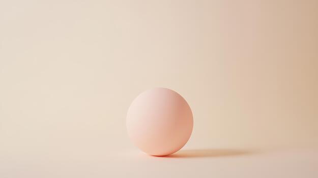 A smooth, round sphere features a gentle gradient, sitting on a neutral-toned surface in a serene and minimalist environment photo