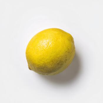 One vibrant yellow lemon with a textured rind, captured in a studio setting and isolated on a plain white background photo